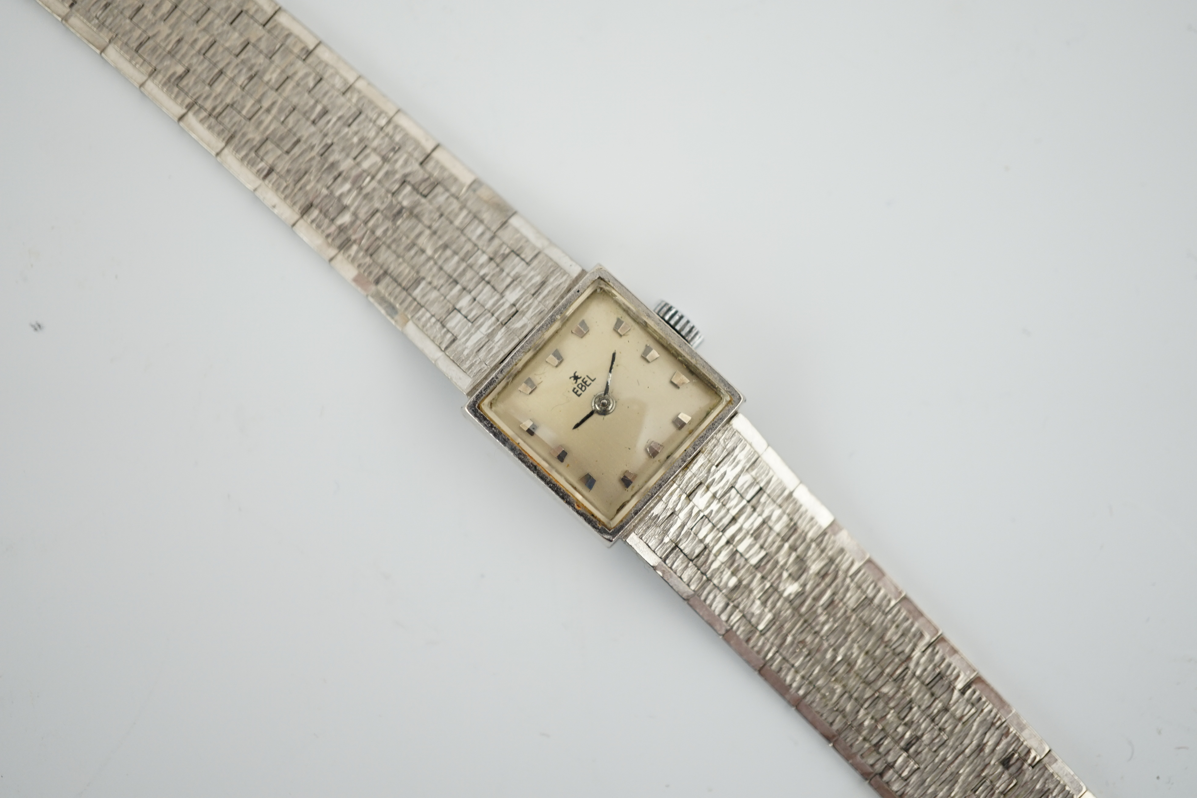 A lady’s 18ct white gold Ebel manual wind wrist watch, with integral 18ct white gold bracelet